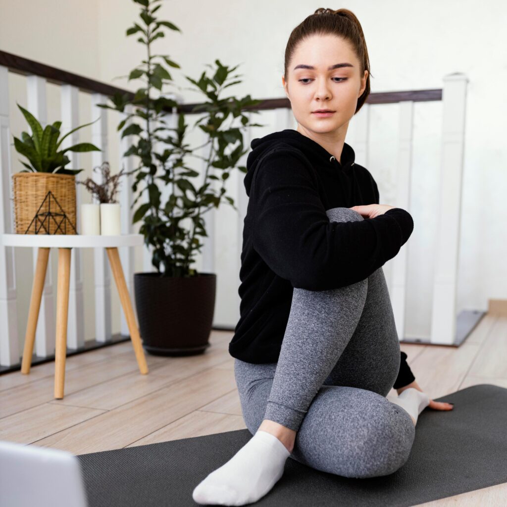 female meditating indoor